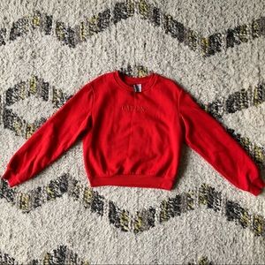 H&M divided “DARLIN’” sweater